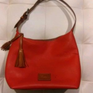 Orange genuine purse Dooney and Bourke handbag